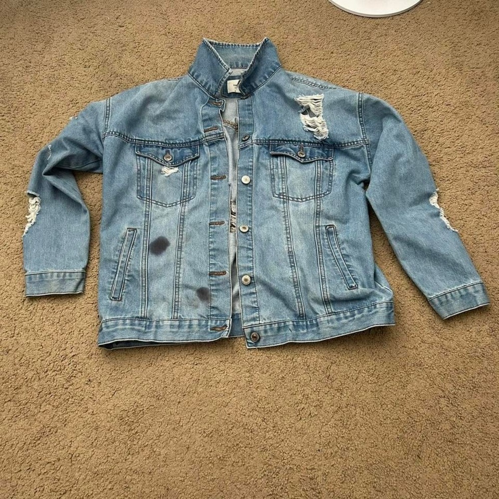 Forever 21 blue denim jacket‎ with distressed details.